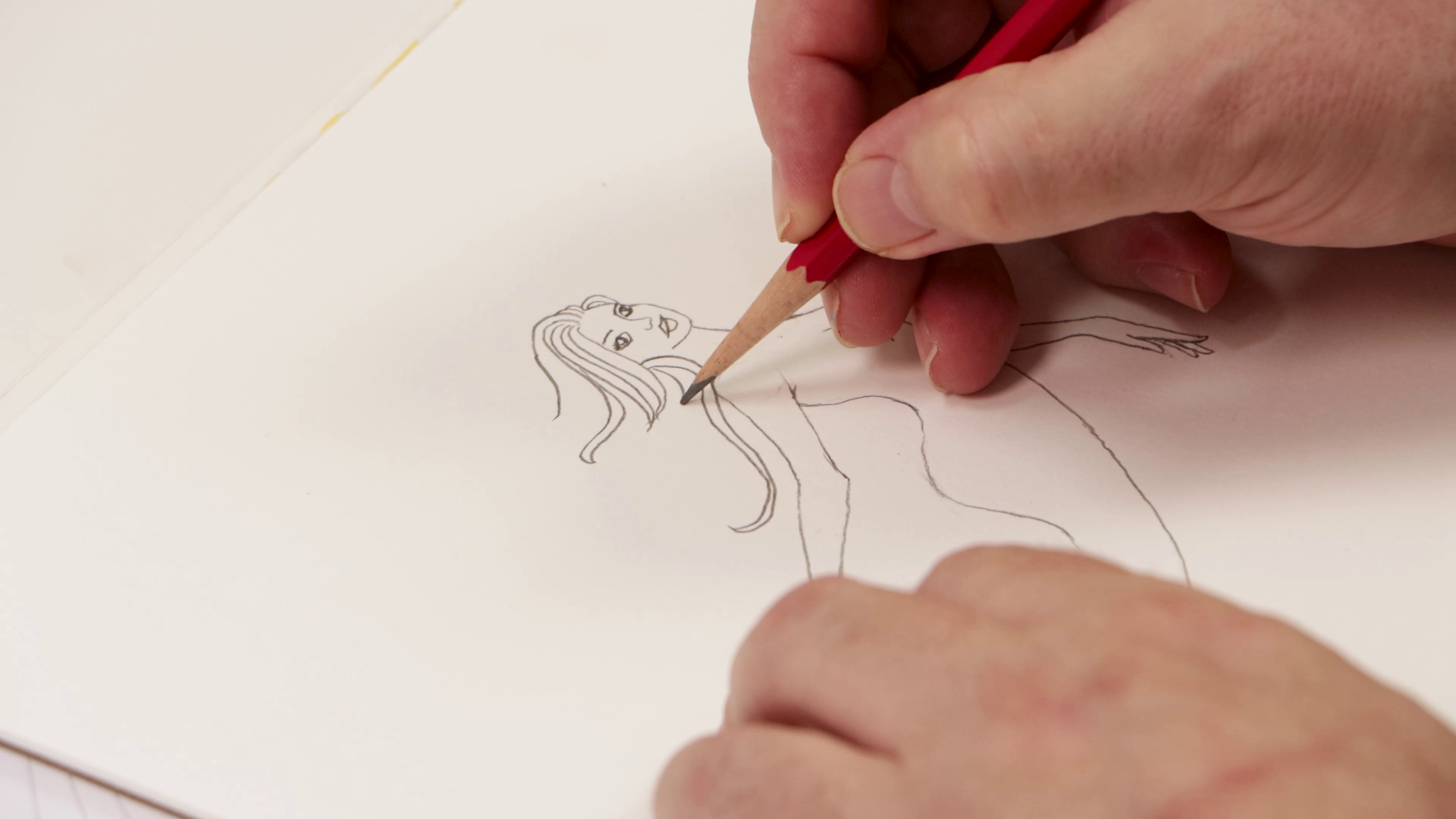 Drawing mermaid in graphite pencil