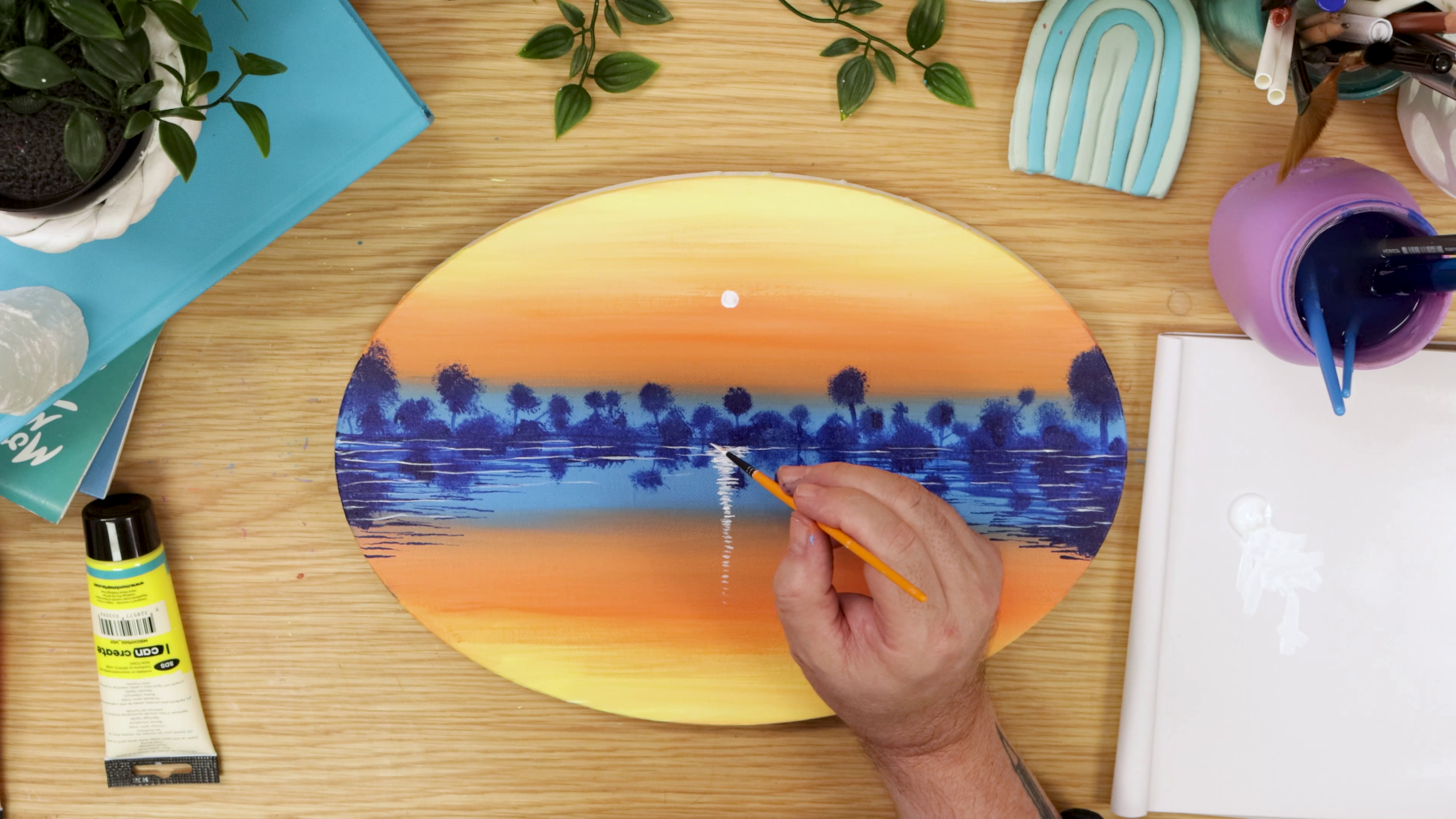 Painting white reflections on sunset artwork