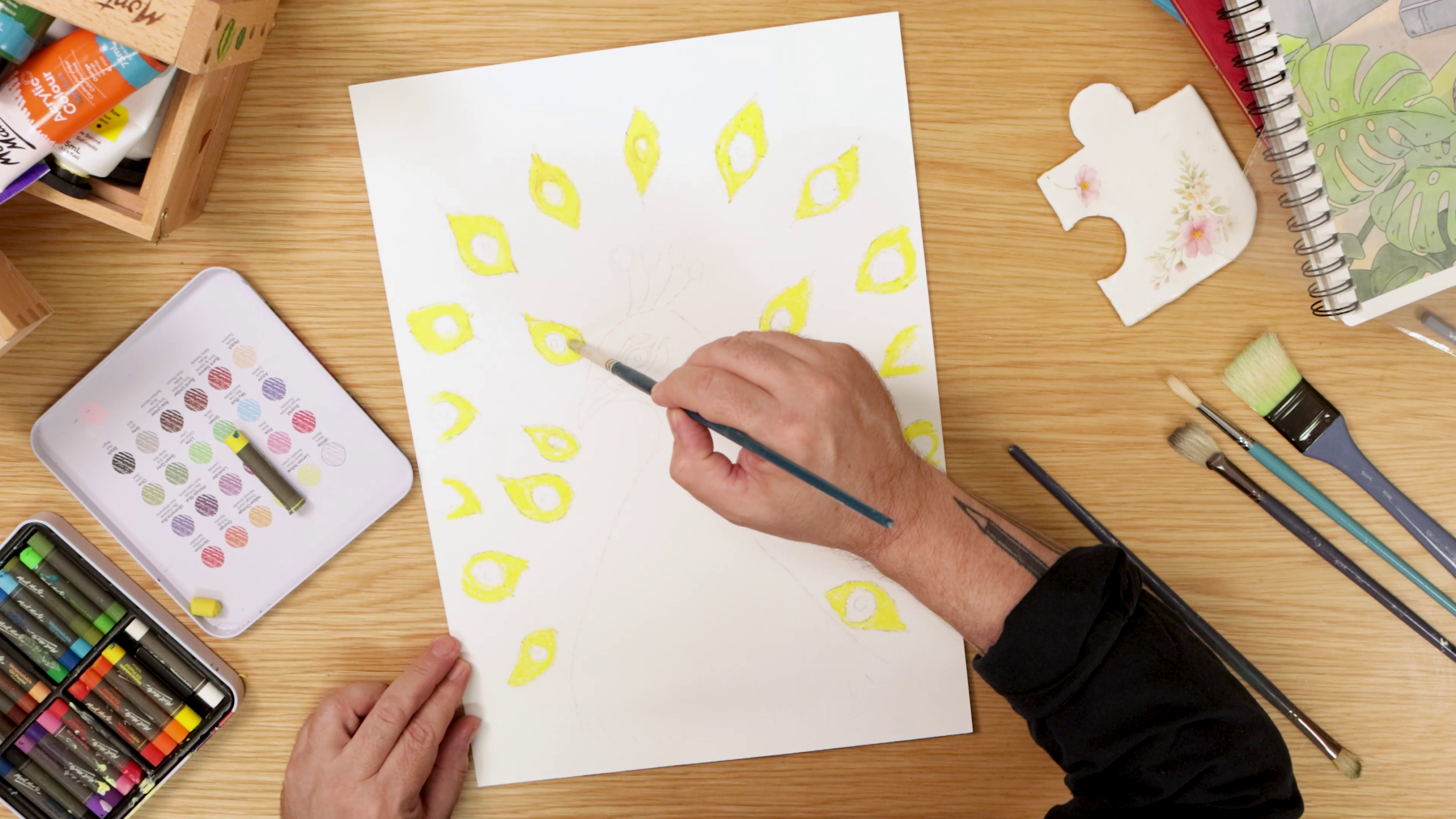 Painting yellow peacock tail feathers