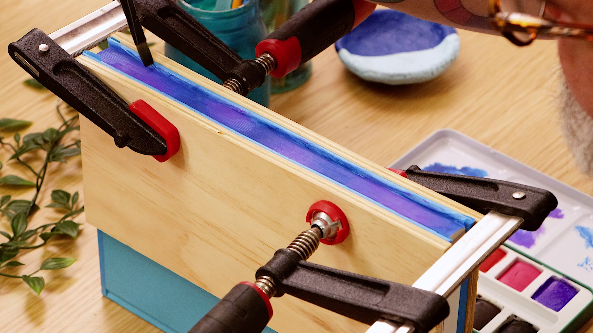 Clamped book with blue and purple painted edge