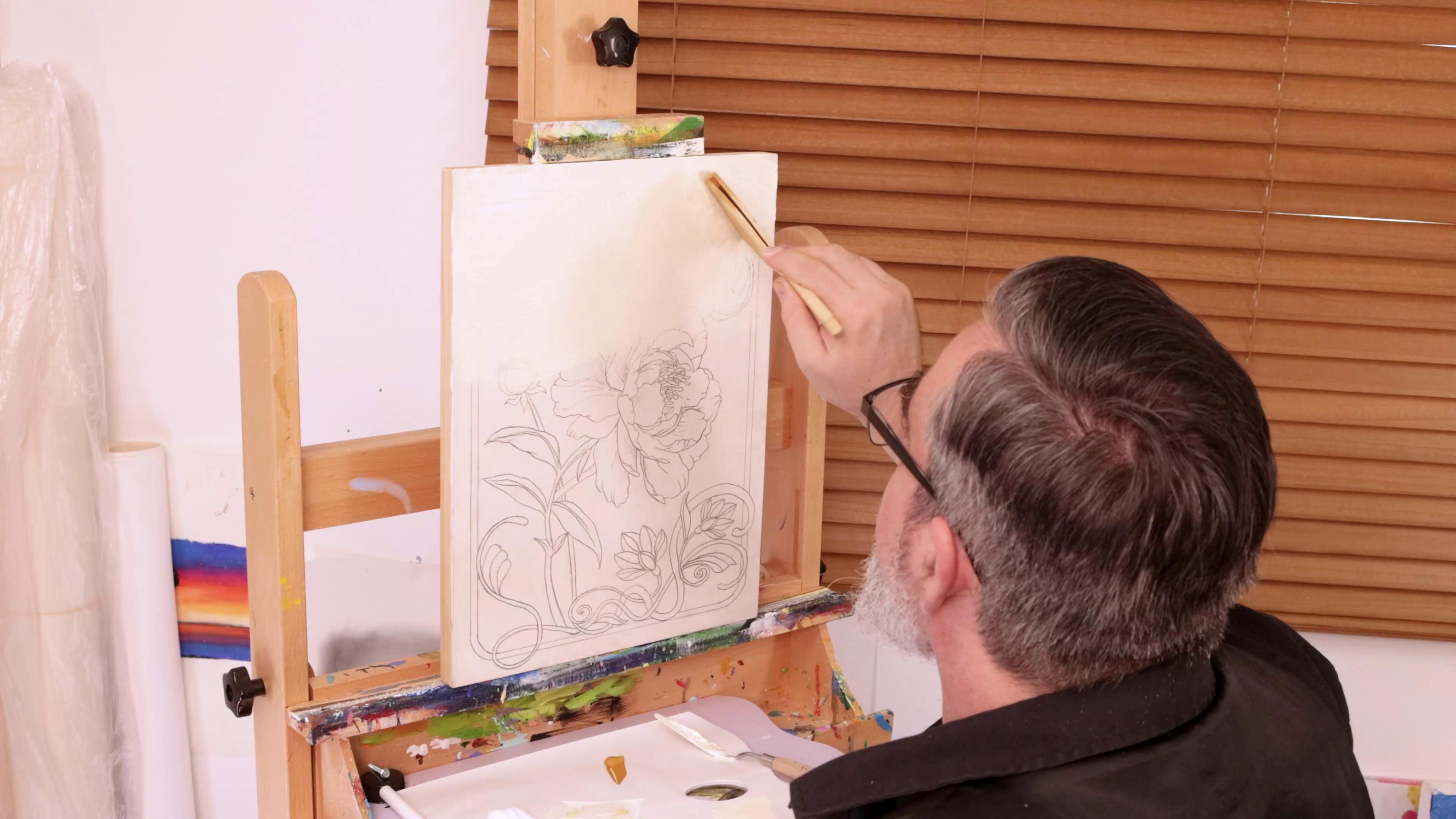 Painting cream colour over peony outline