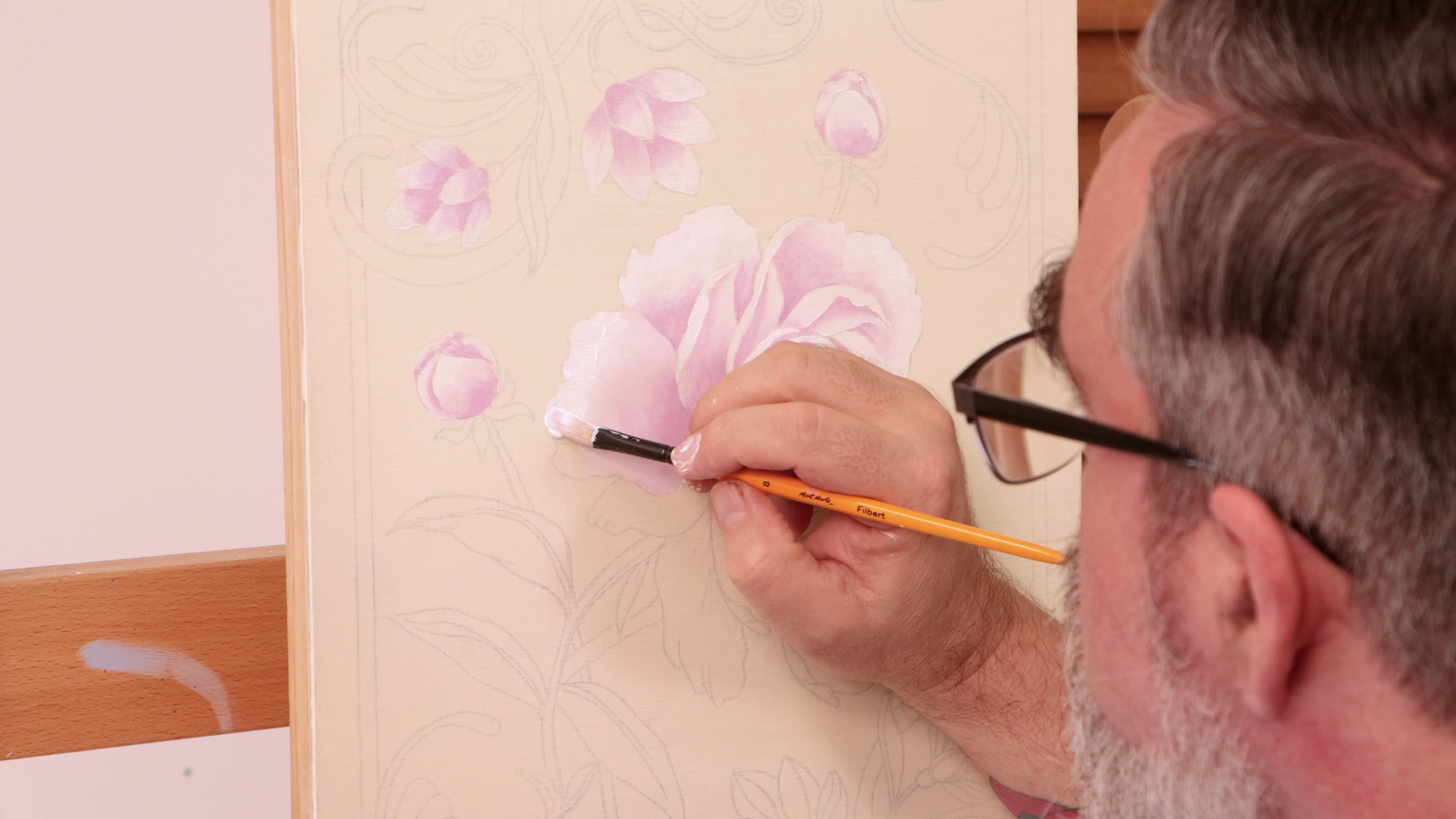 Painting white and pink to create peony leaves