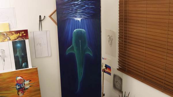 Shark colours painted in underwater scene