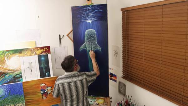 Markings being painted on whale shark 