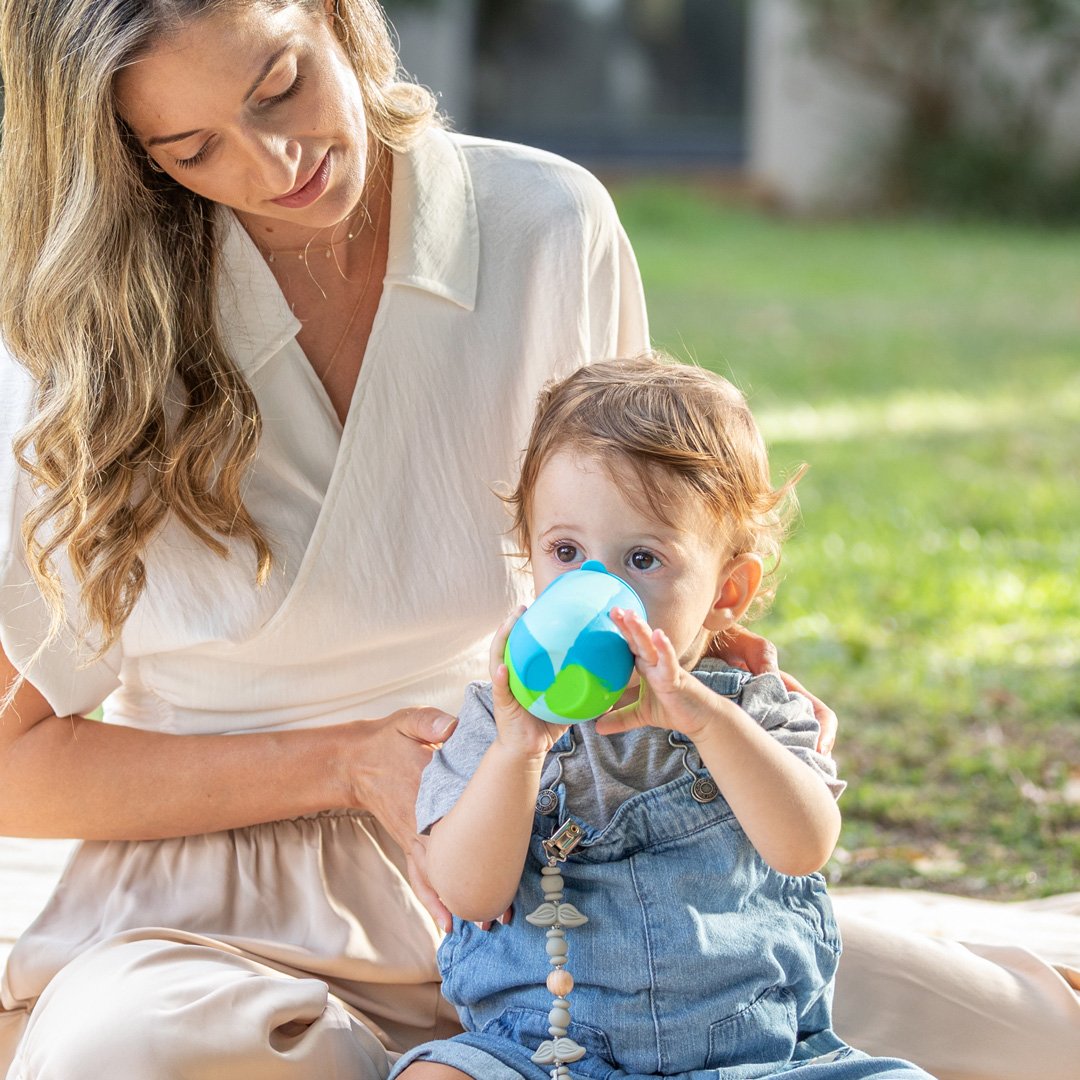 Child drinking from a sippy cup