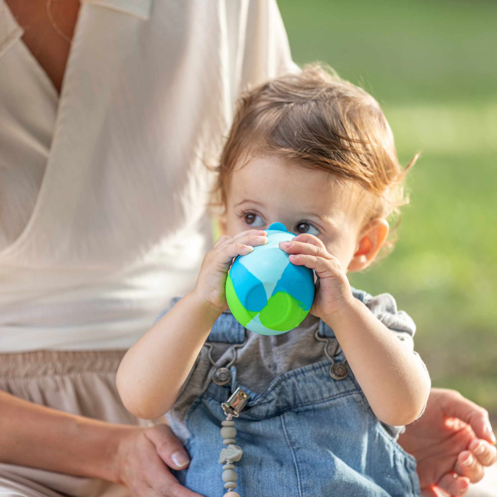 baby drinking from cup