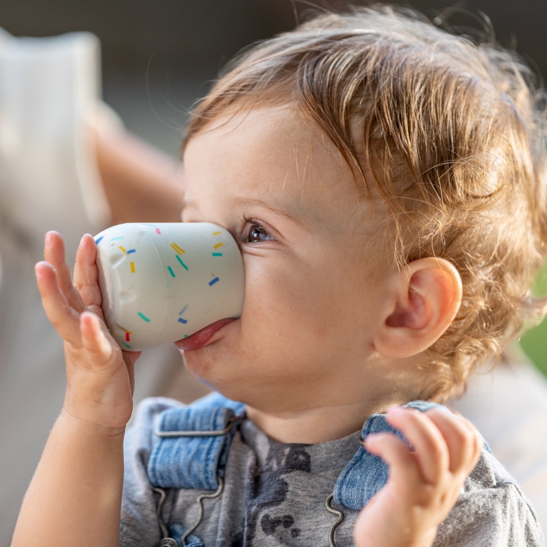 Toddler Drinking Milk Bottle