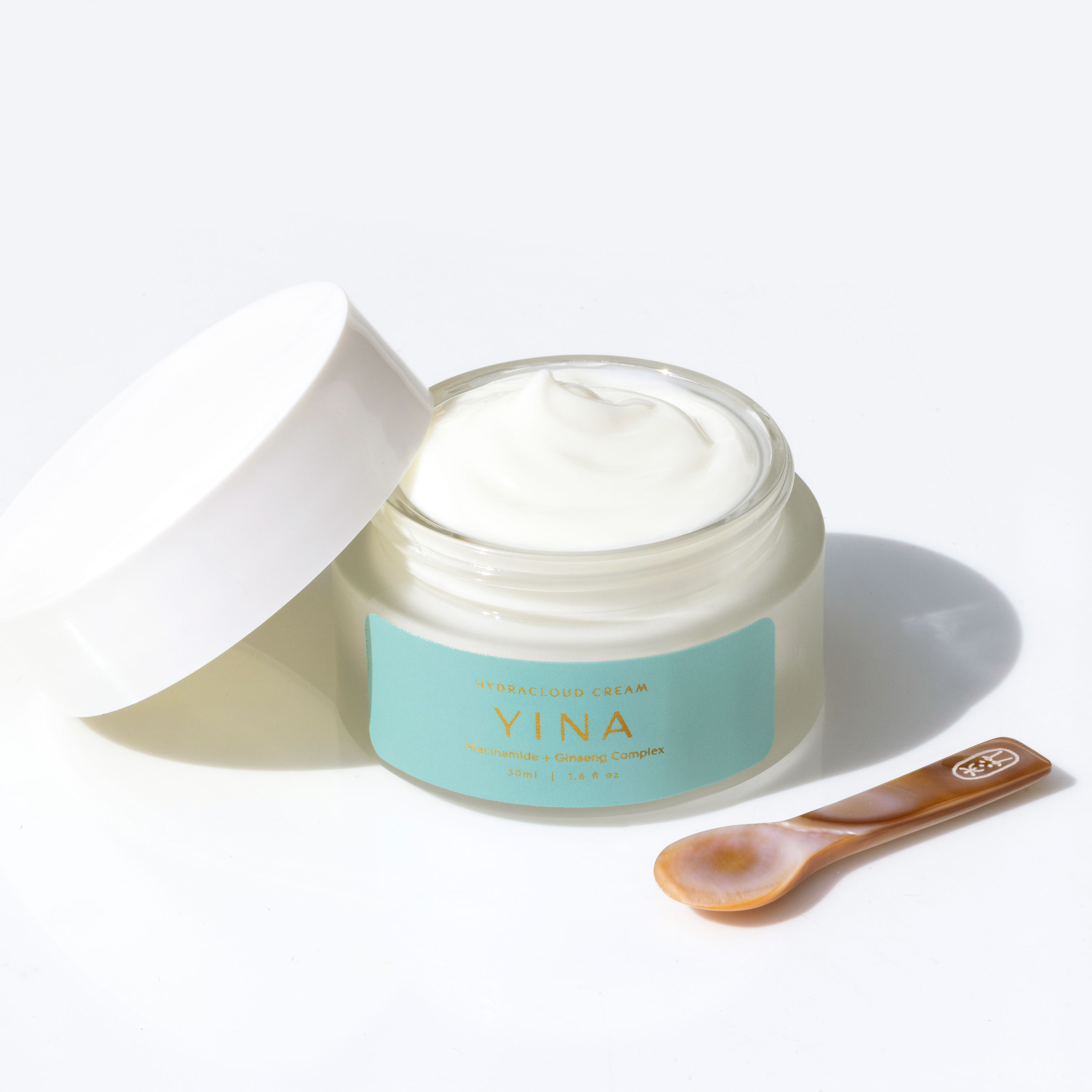 yina hydracloud cream and mother of pearl spoon