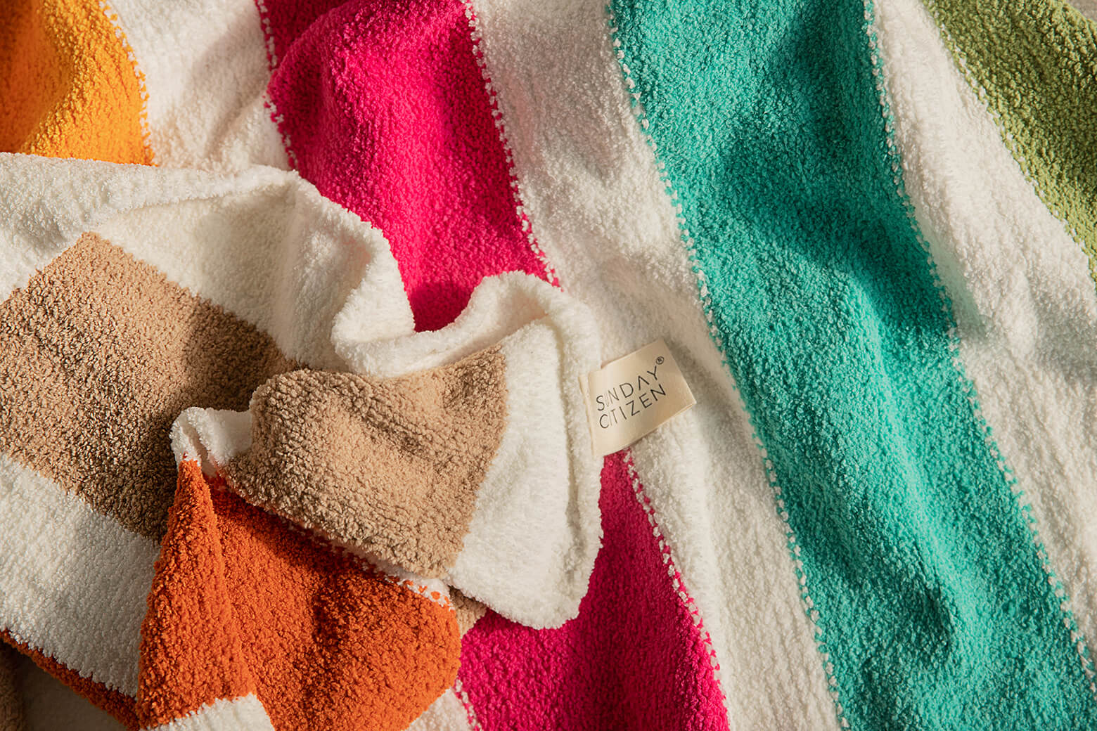 Sunday Citizen Burano Throw in Vibrant. Vibrant striped throw blanket.